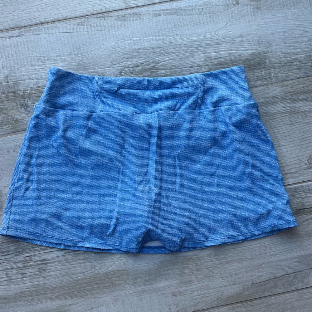 Tommy bahama women’s mini skirt light blue stretch size M with zipperr NWOT